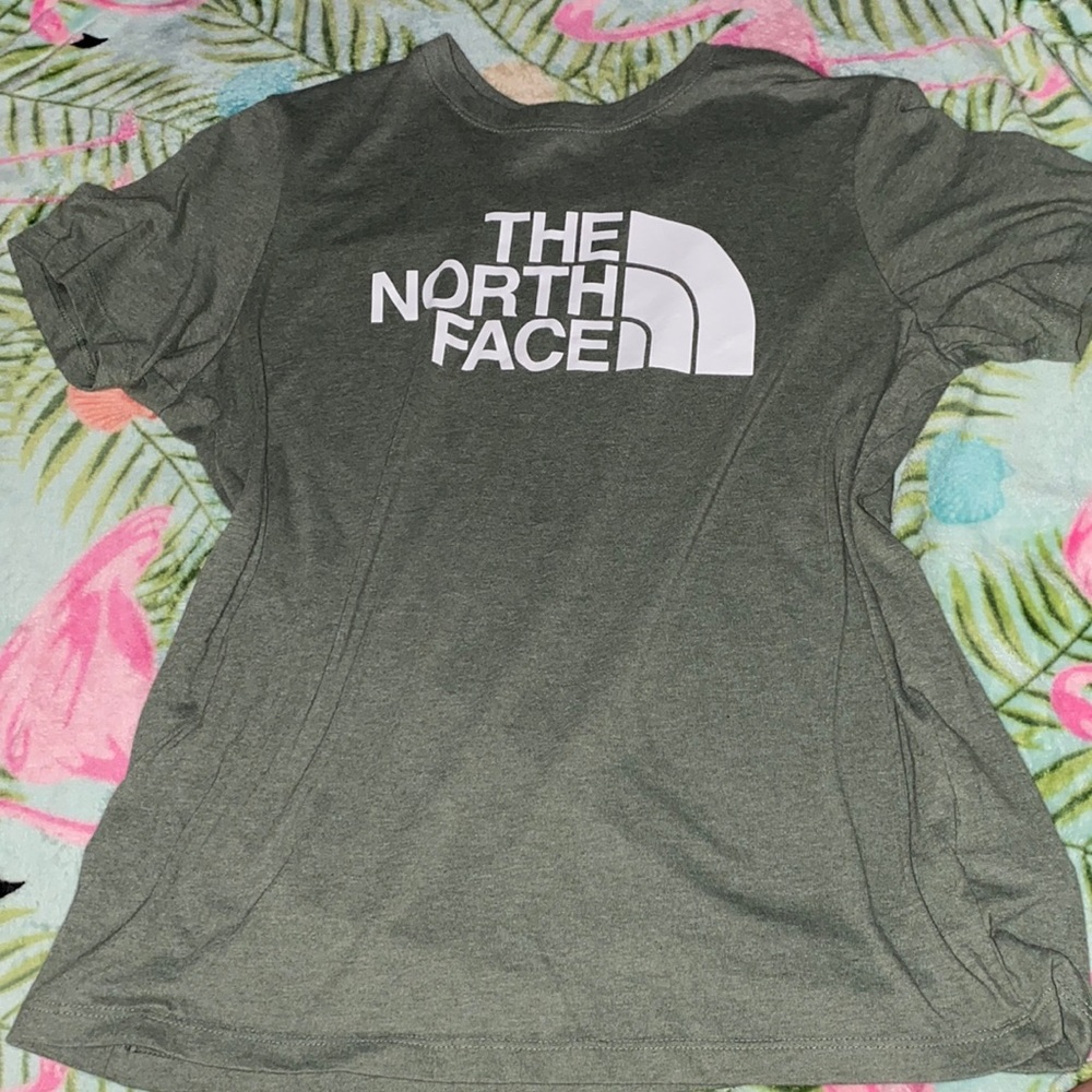 Green north face shirt. Pretty much brand new